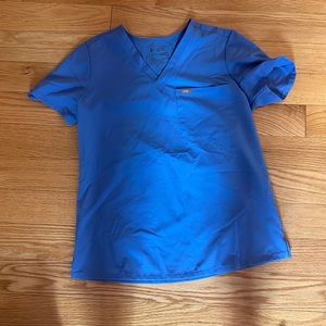 Light blue in perfect condition. Great fit. Got them for a contract that ended.